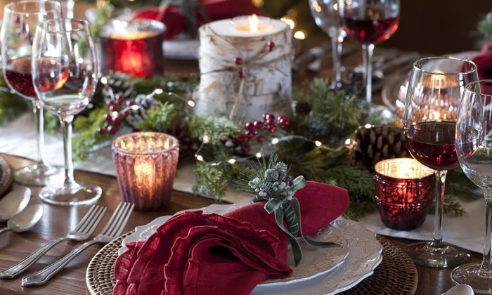 Christmas holiday dining table elegant place setting. Very shallow depth