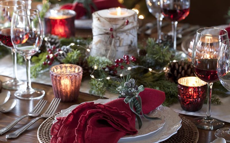 Christmas holiday dining table elegant place setting. Very shallow depth
